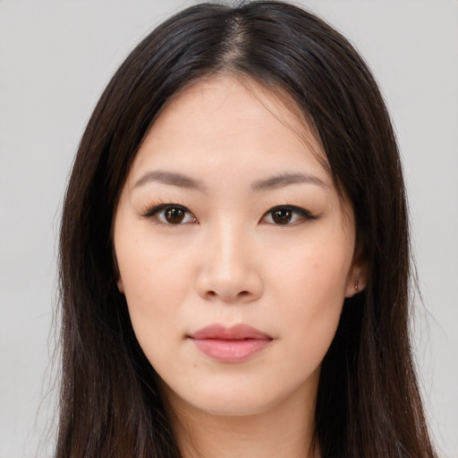 Neutral asian young-adult female with long  brown hair and brown eyes