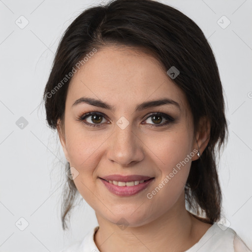 Joyful white young-adult female with medium  brown hair and brown eyes