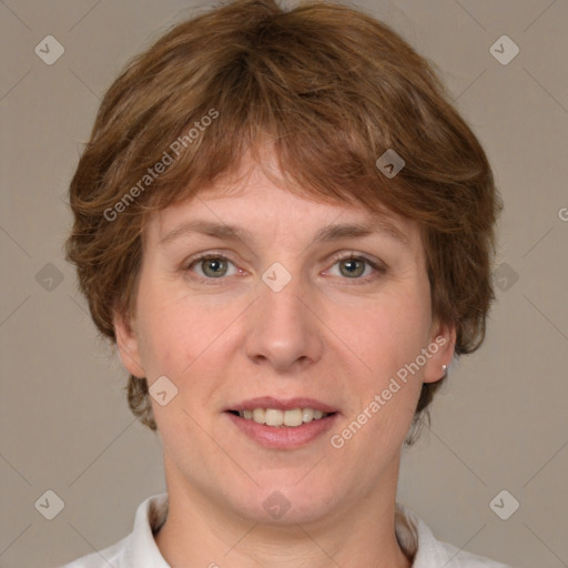 Joyful white adult female with medium  brown hair and grey eyes