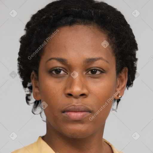 Neutral black young-adult female with short  brown hair and brown eyes