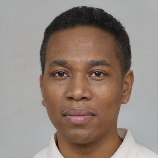 Neutral latino adult male with short  black hair and brown eyes