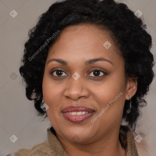 Joyful black adult female with medium  brown hair and brown eyes