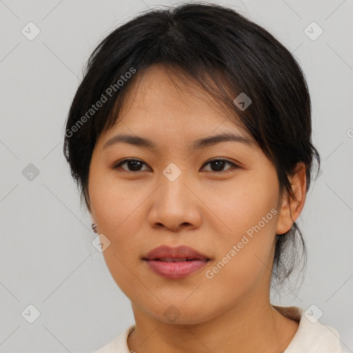 Joyful asian young-adult female with medium  brown hair and brown eyes