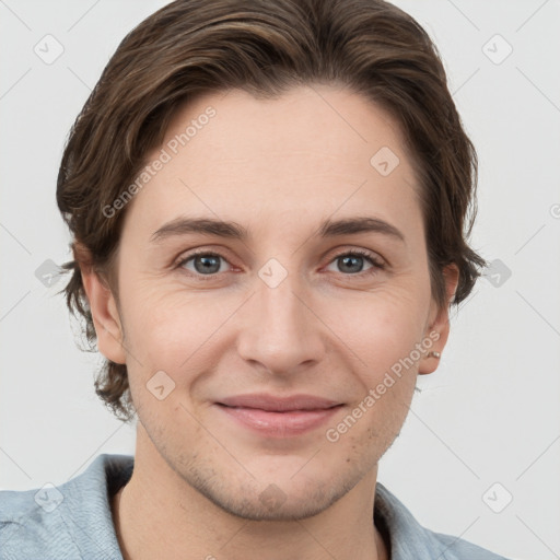 Joyful white young-adult female with short  brown hair and grey eyes