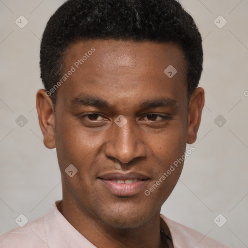 Joyful black young-adult male with short  brown hair and brown eyes