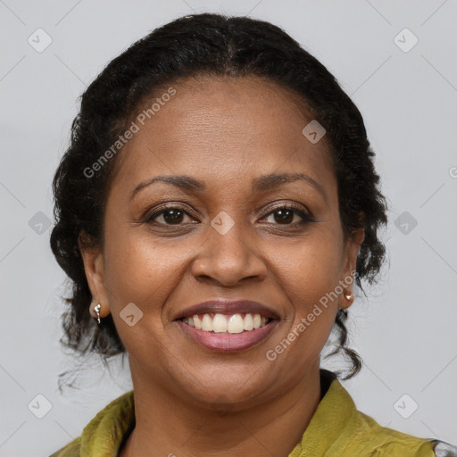 Joyful latino adult female with medium  brown hair and brown eyes