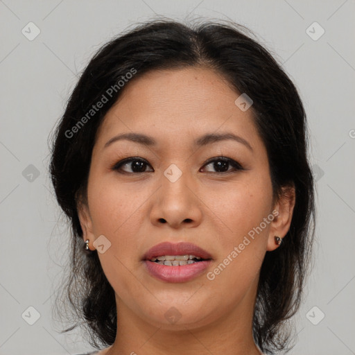 Joyful latino young-adult female with medium  brown hair and brown eyes