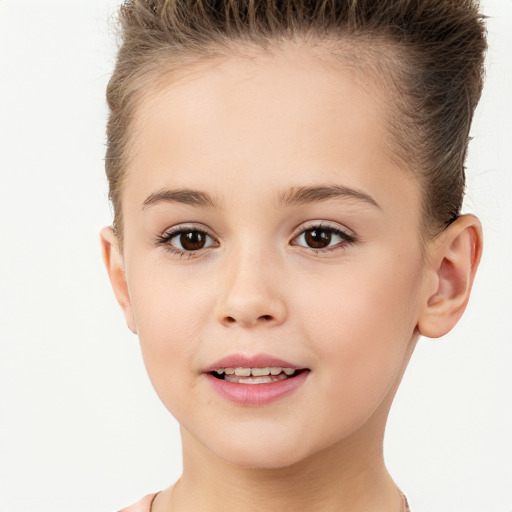 Joyful white child female with short  brown hair and brown eyes