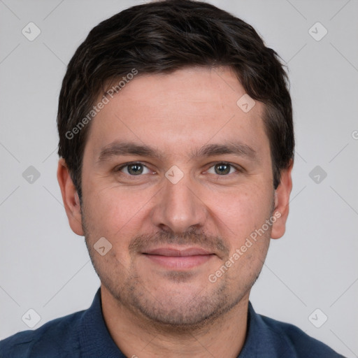 Joyful white young-adult male with short  brown hair and brown eyes