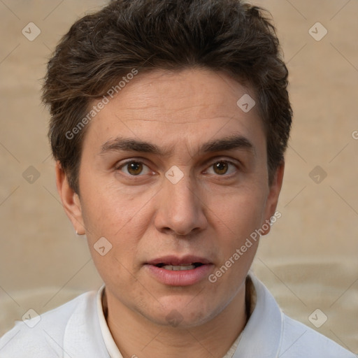 Joyful white adult male with short  brown hair and brown eyes