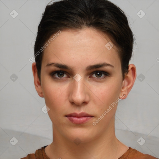 Neutral white young-adult female with short  brown hair and brown eyes