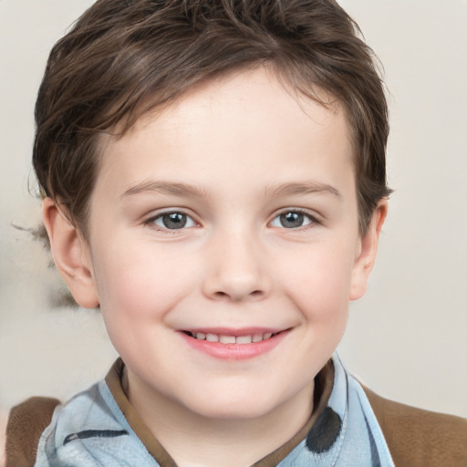 Joyful white child female with short  brown hair and grey eyes