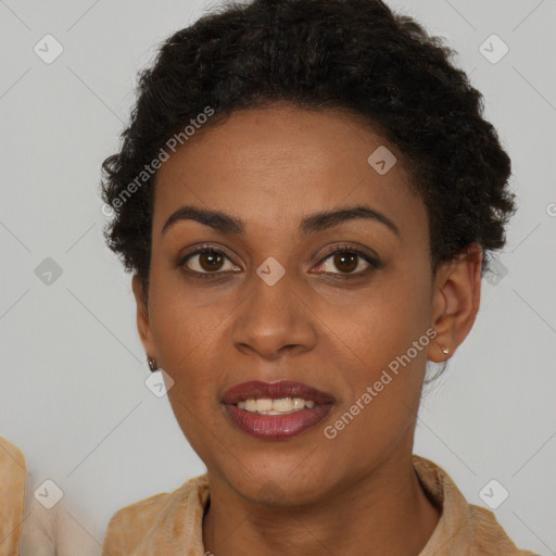 Joyful black young-adult female with short  brown hair and brown eyes