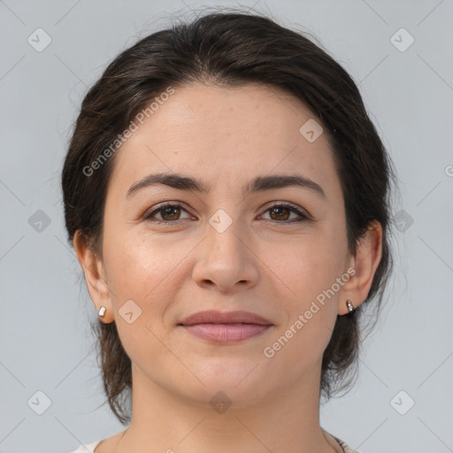 Joyful white young-adult female with medium  brown hair and brown eyes