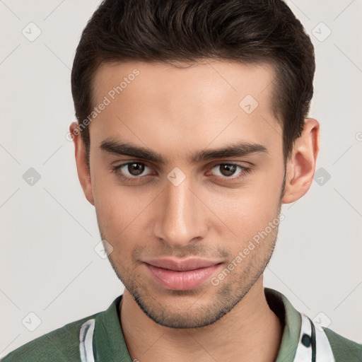 Joyful white young-adult male with short  brown hair and brown eyes