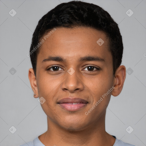 Joyful black young-adult male with short  black hair and brown eyes