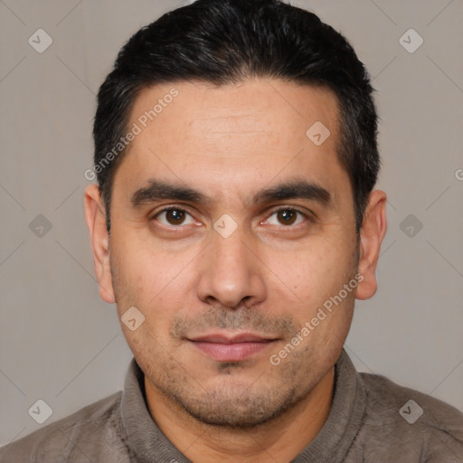 Joyful white young-adult male with short  black hair and brown eyes