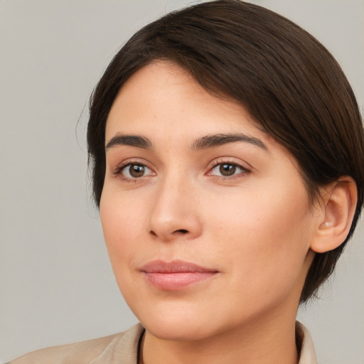 Neutral white young-adult female with medium  brown hair and brown eyes