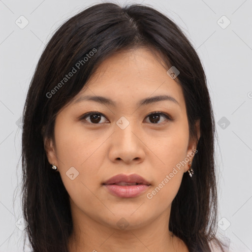 Joyful asian young-adult female with long  brown hair and brown eyes