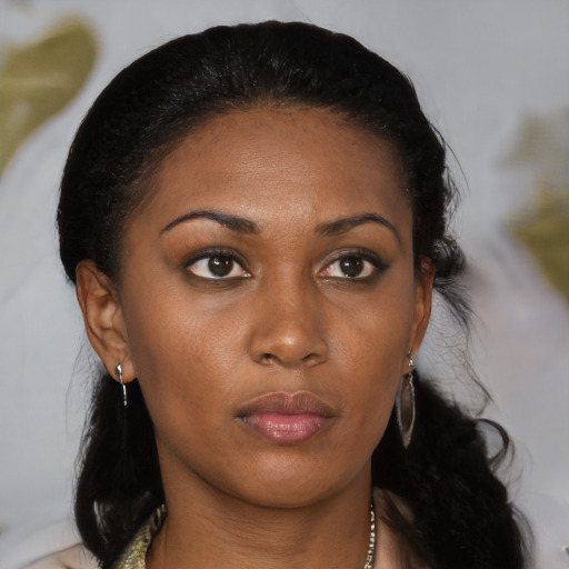 Neutral black young-adult female with medium  black hair and brown eyes