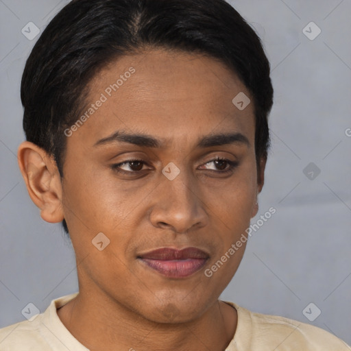 Joyful latino young-adult male with short  brown hair and brown eyes