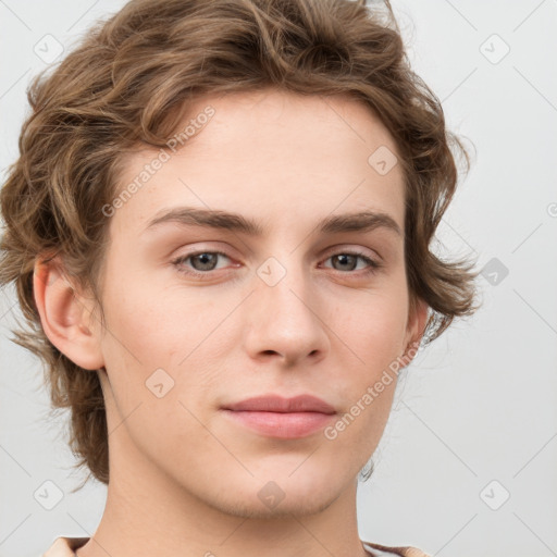 Joyful white young-adult male with medium  brown hair and grey eyes