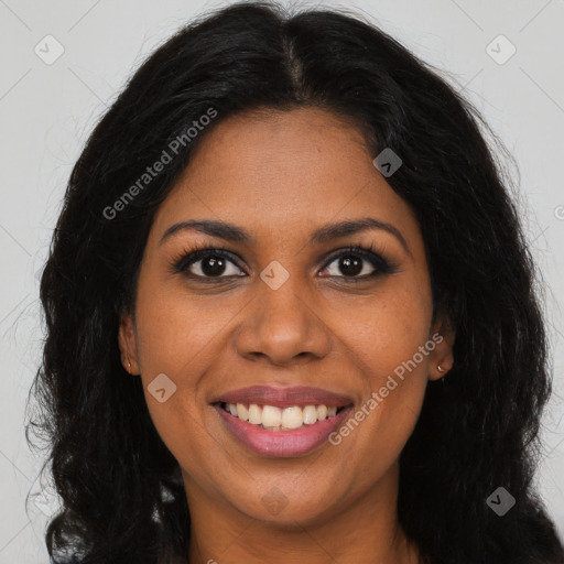 Joyful black young-adult female with long  brown hair and brown eyes