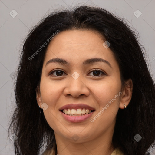 Joyful latino young-adult female with long  brown hair and brown eyes