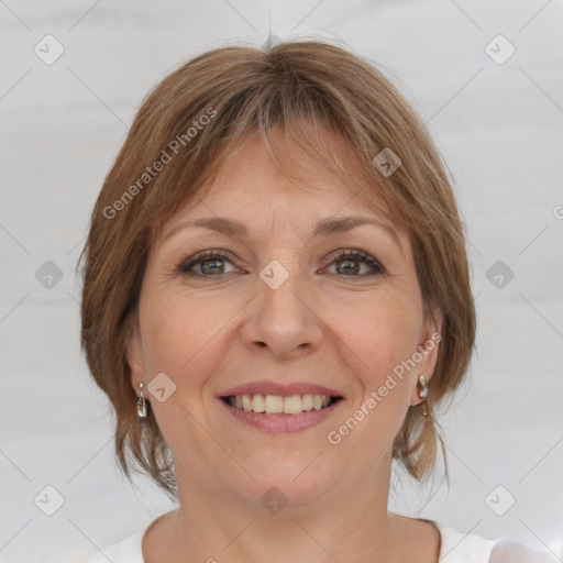 Joyful white adult female with medium  brown hair and grey eyes