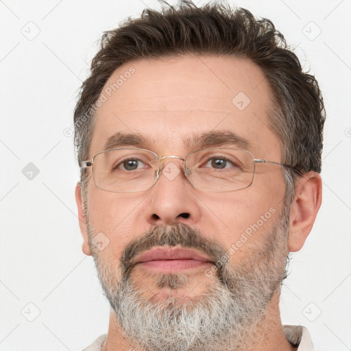 Neutral white adult male with short  brown hair and brown eyes