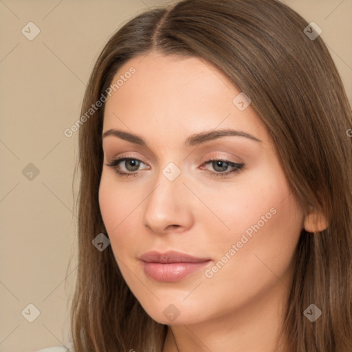 Neutral white young-adult female with long  brown hair and brown eyes