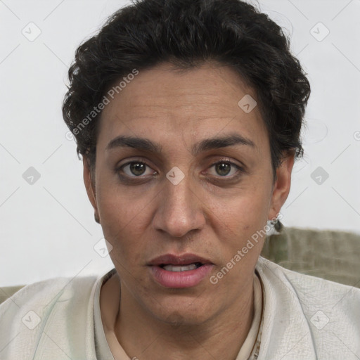 Joyful white adult female with short  brown hair and brown eyes