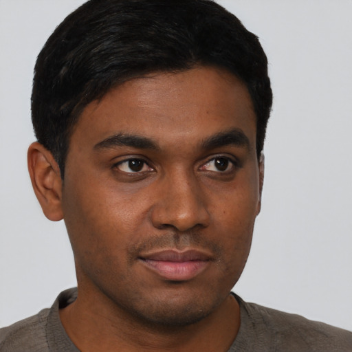 Neutral black young-adult male with short  brown hair and brown eyes