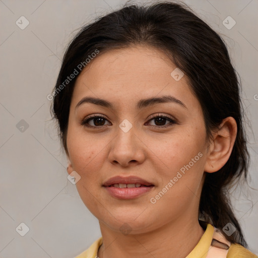 Joyful latino young-adult female with medium  brown hair and brown eyes