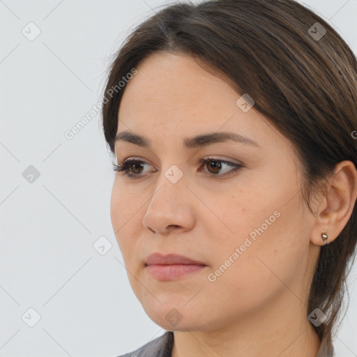 Neutral white young-adult female with medium  brown hair and brown eyes