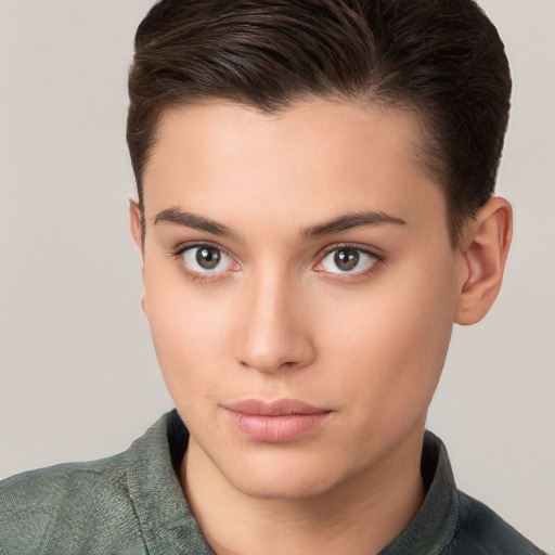 Neutral white young-adult female with short  brown hair and brown eyes