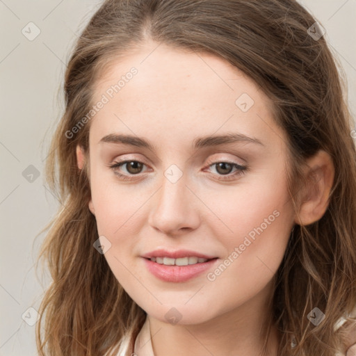 Joyful white young-adult female with long  brown hair and green eyes