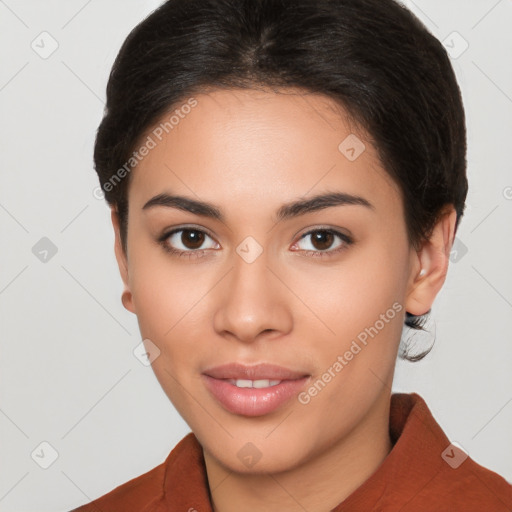 Joyful latino young-adult female with short  brown hair and brown eyes