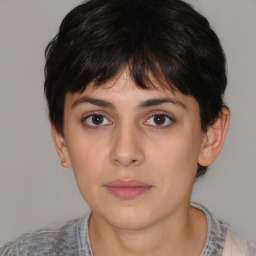 Neutral white young-adult female with short  brown hair and brown eyes