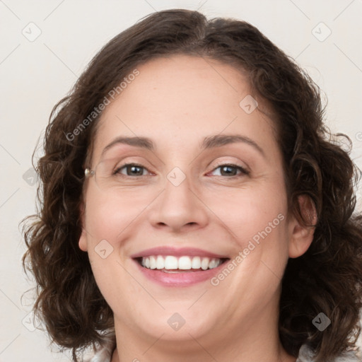 Joyful white young-adult female with medium  brown hair and green eyes