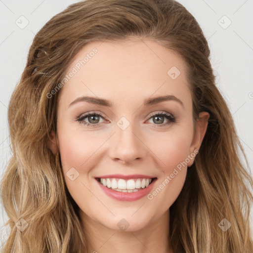 Joyful white young-adult female with long  brown hair and green eyes