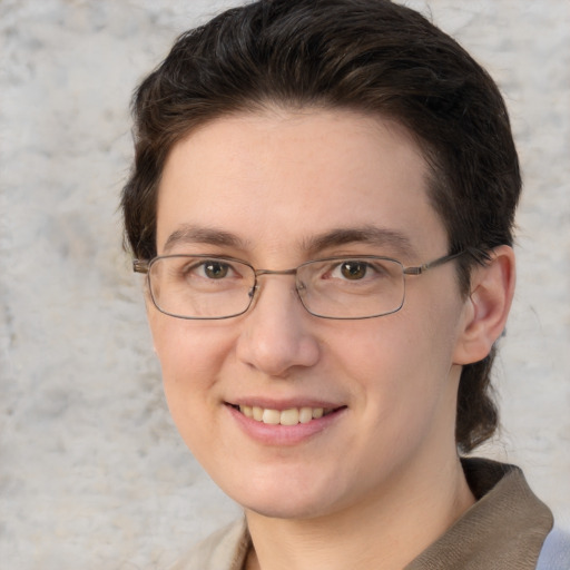 Joyful white adult female with short  brown hair and brown eyes