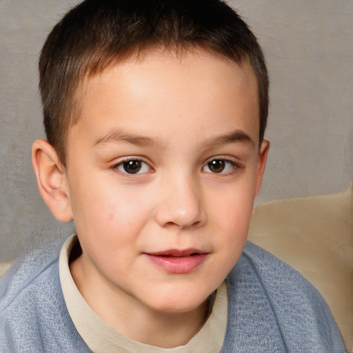 Joyful white child male with short  brown hair and brown eyes