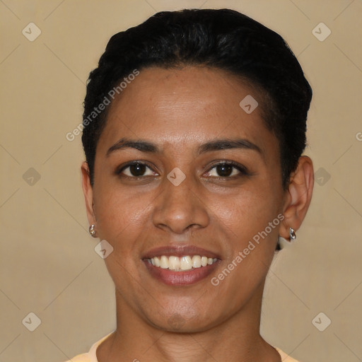 Joyful latino young-adult female with short  black hair and brown eyes