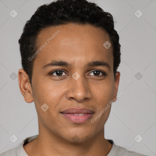 Joyful latino young-adult male with short  brown hair and brown eyes