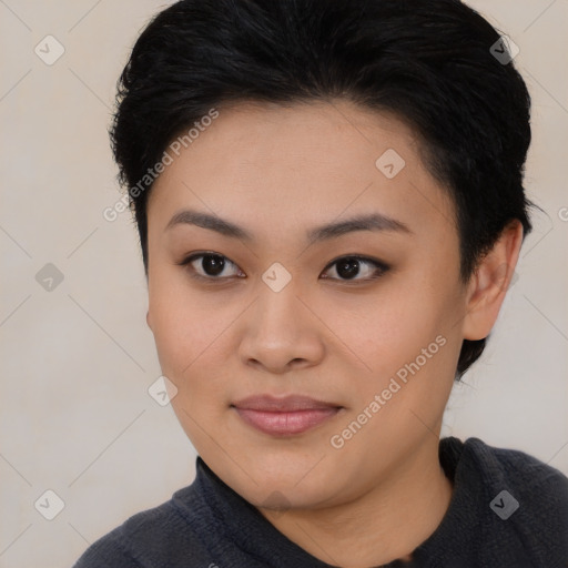 Joyful asian young-adult female with short  black hair and brown eyes