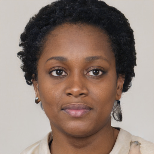 Neutral black young-adult female with short  brown hair and brown eyes