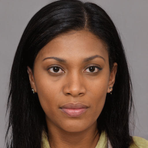 Joyful asian young-adult female with long  brown hair and brown eyes