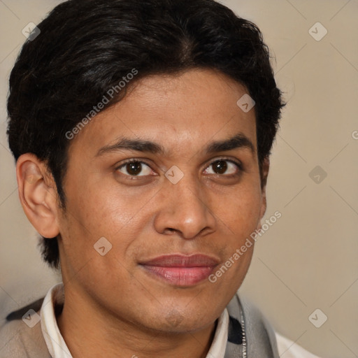 Joyful latino adult male with short  brown hair and brown eyes