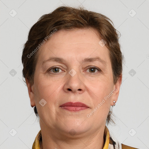 Joyful white adult female with short  brown hair and grey eyes